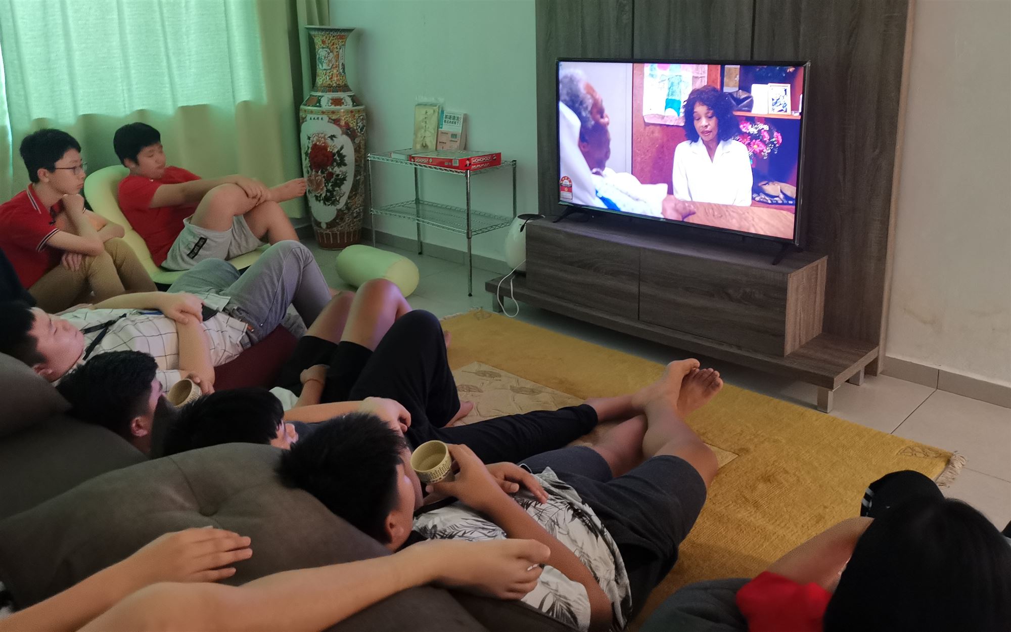 Harvest Academy boarders relaxing together in the boarding house